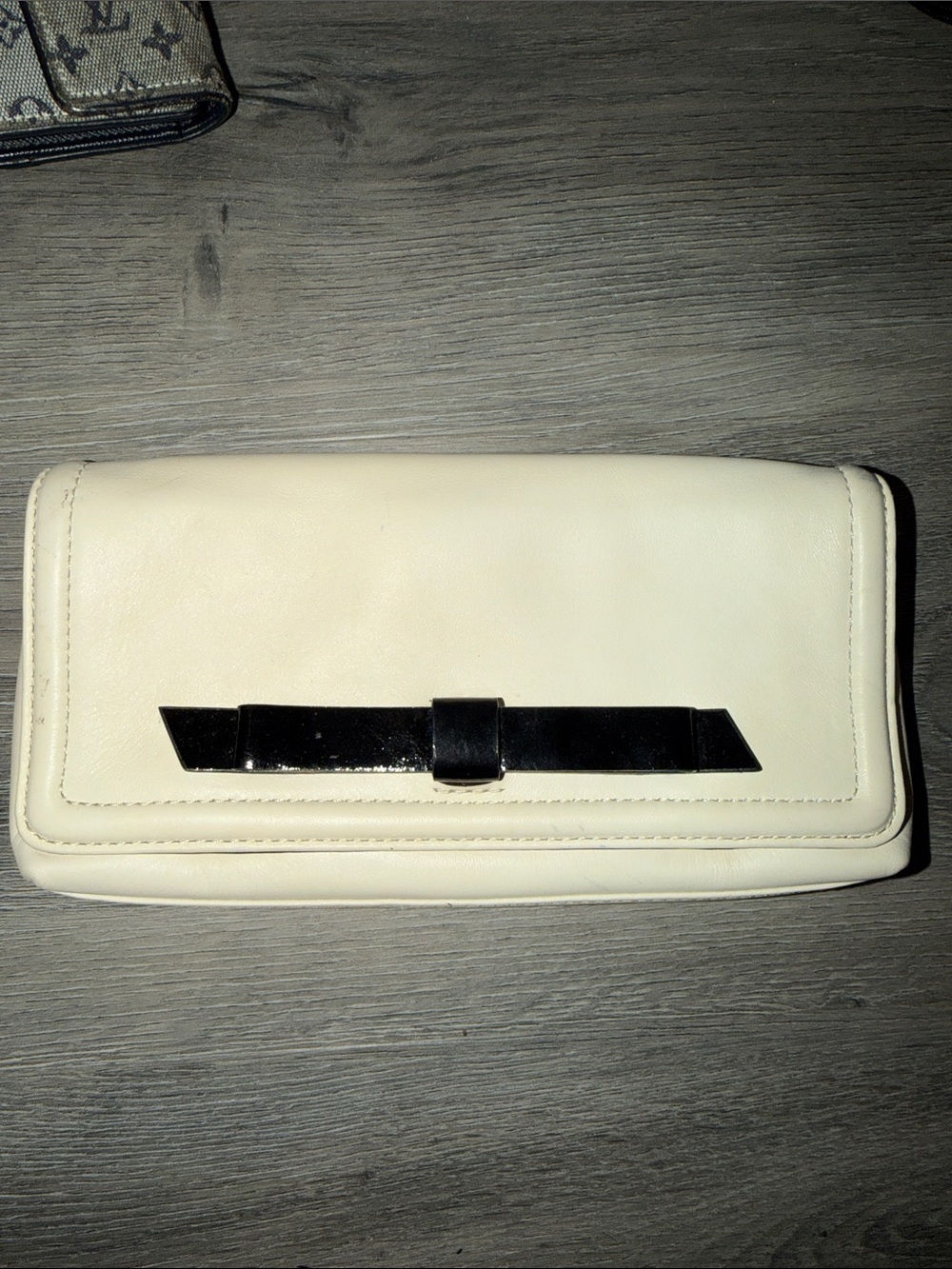 Kate Spade Ivory Leather Clutch with Black Bow